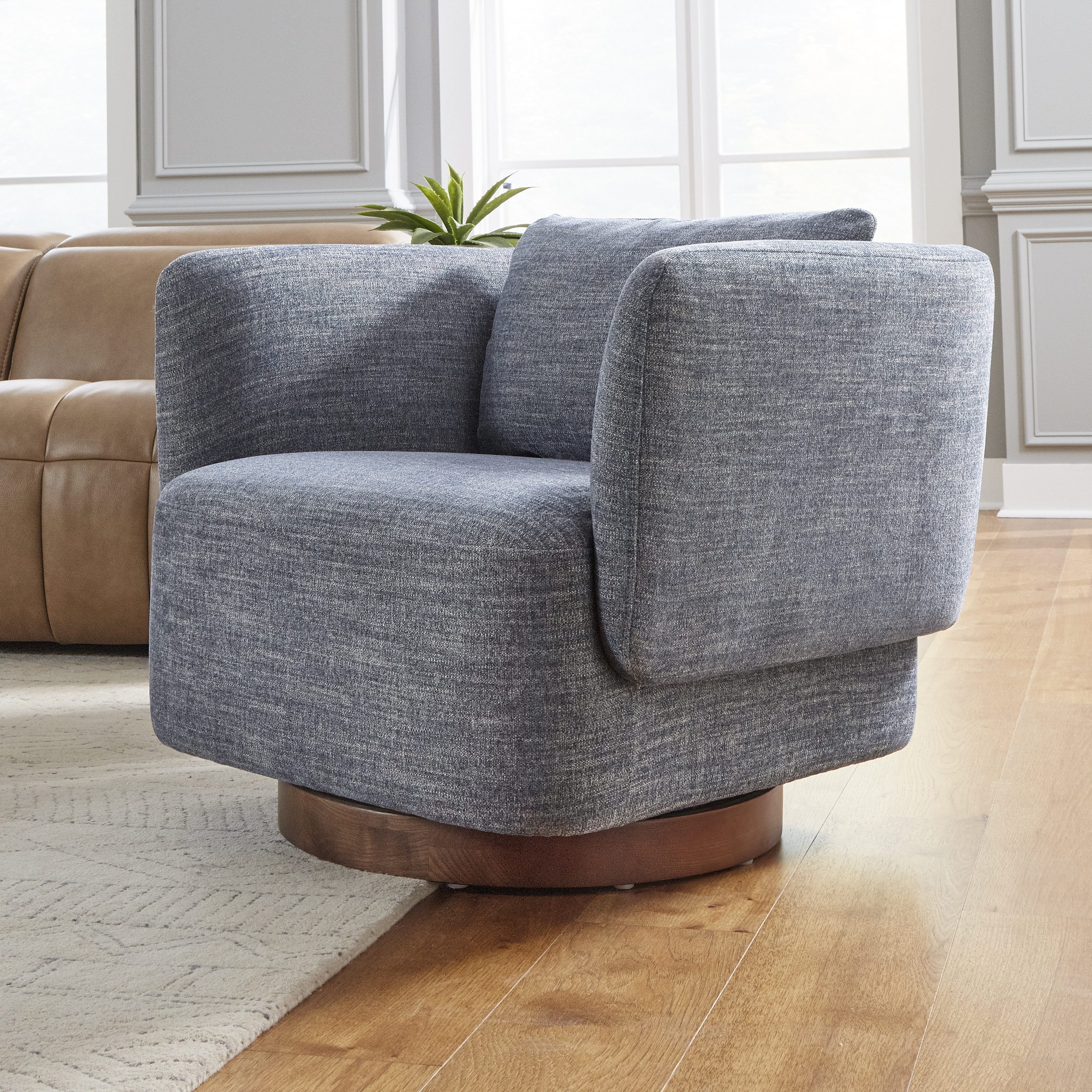 Kuka Home Furnishings navy blue textured upholstered swivel lounge