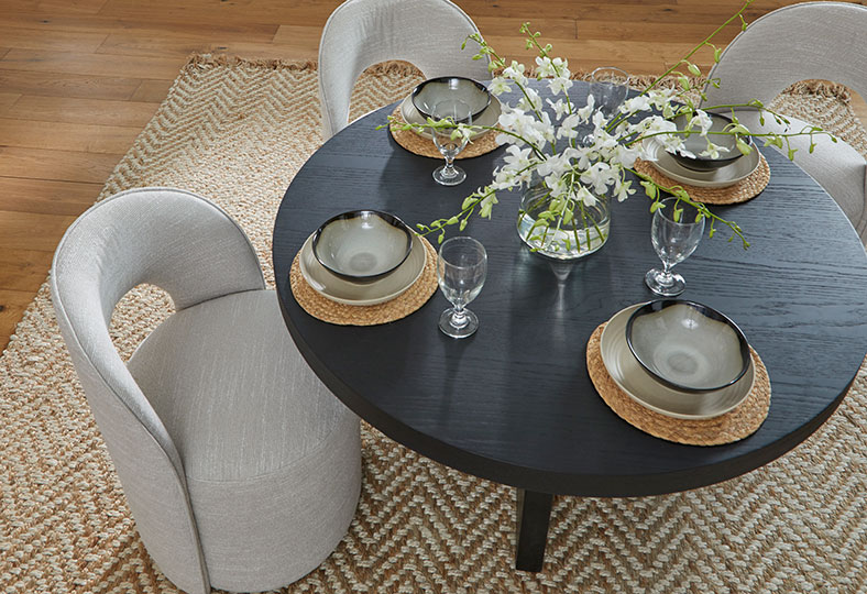 Kuka Home Dining set with dark wood circular table and upholstered dining chairs