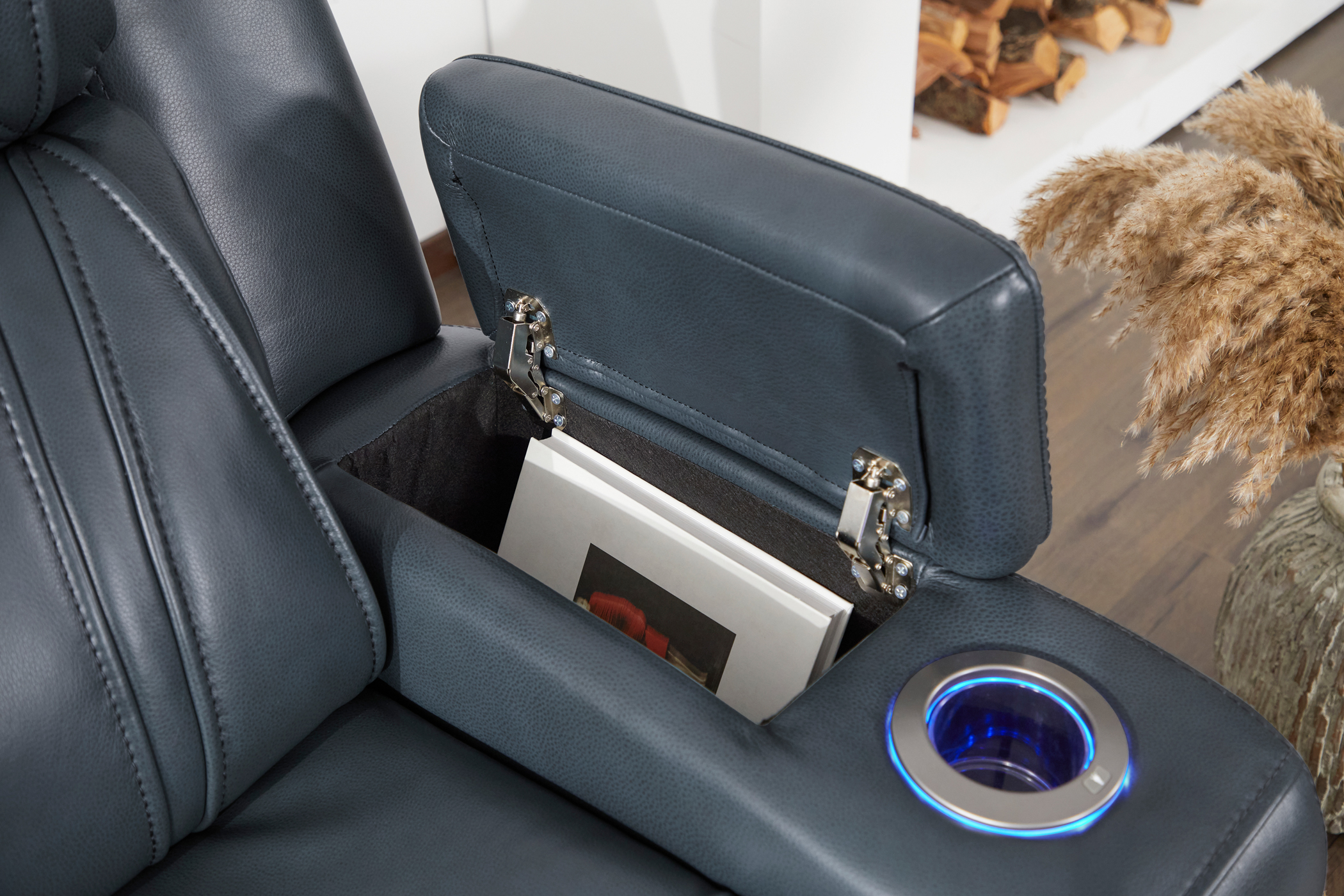 couch with armrest storage and cup holder 